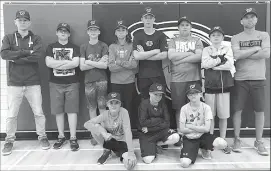  ?? Photo submitted by Garrett Simmons ?? Wilson Baseball Academy coaches Ryan Seifert, far left, and Reg Dueck, far right, are shown with initial academy players.