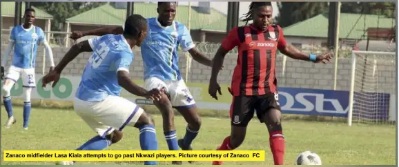  ??  ?? Zanaco midfielder Lasa Kiala attempts to go past Nkwazi players. Picture courtesy of Zanaco FC