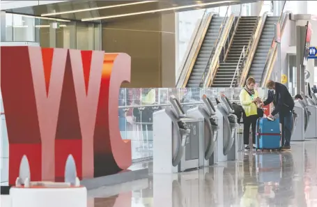  ?? AZIN GHAFFARI ?? The Calgary airport expects even fewer people to fly through its terminals this year: 5.1 million compared with 5.7 million in 2020.