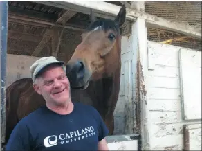  ?? — PNG FILES ?? Horse owner Randy Hudson smiles next to Cowie Creek, a four-yearold and recent winner at Hastings Racecourse.