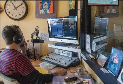  ?? Arkansas Democrat-Gazette/CARY JENKINS ?? Low Key Arts Executive Director Sonny Kay mans the mic during his show The Bassics on Hot Springs’ solar-powered, low-wattage FM station KUHS.