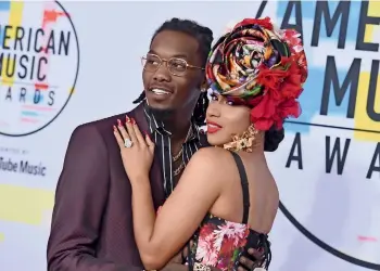  ??  ?? Offset, left, and Cardi B arrive at the American Music Awards in October held in Los Angeles