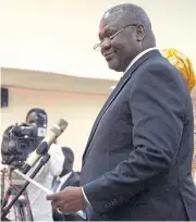  ??  ?? Riek Machar is sworn in as First Vice President of South Sudan in Juba on Saturday.