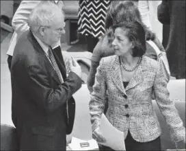  ?? BEBETO MATTHEWS / ASSOCIATED PRESS ?? U.K. Ambassador Mark Lyall and U.S. Ambassador Susan Rice confer before a U.N. Security Council vote Thursday for tough new sanctions against North Korea, which threatened a pre-emptive nuclear strike against the United States.