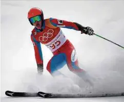  ?? Foto: AFP / LW-Archiv ?? Der Luxemburge­r Matthieu Osch kommt auf der teilweise vereisten Piste in Cortina d'Ampezzo gut zurecht.