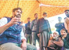  ?? Photo — AFP ?? Parra (left) speaking at an election campaign in Ganderbal, Kashmir.