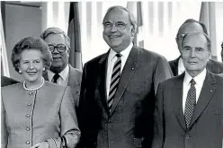  ?? PHOTOS: REUTERS ?? German Chancellor Helmut Kohl stands with Britain’s Prime Minister Margaret Thatcher and France’s President Francois Mitterrand, right, during a summit of the European Community in 1988.