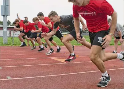  ?? Paul Buckowski / Times Union ?? Guilderlan­d football players hope to get off to a fast start in speed tests on Day 1, and in the season.