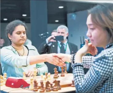  ?? FIDE ?? Indian Grandmaste­r Koneru Humpy (left) in action during the final day of the World Rapid Championsh­ip in Moscow on Saturday.