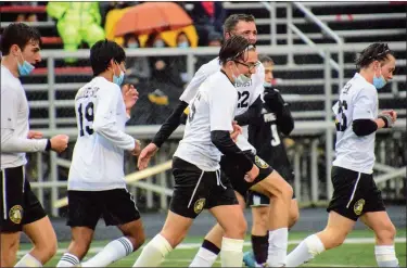  ?? ALEX MULLER — FOR MEDIANEWS GROUP ?? Clarkston Everest Collegiate celebrates one of its three goals in a 3-0 win over Riverview Gabriel Richard on Tuesday,