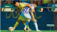  ?? AFP ?? Villarreal’s Pablo Fornals (left) vies with Valladolid’s forward Duje Cop during their Spanish league match on Sunday. —