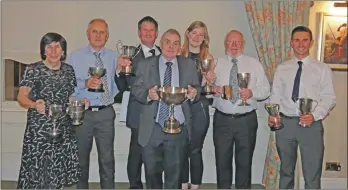  ??  ?? Keelboat winners with their trophies.