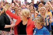  ?? [PHOTO BY DOUG HOKE, THE OKLAHOMAN] ?? American Federation of Teachers President Randi Weingarten and U.S. Senator and NWC alum Elizabeth Warren, enter the AFT education rally at Northwest Classen High School in September.