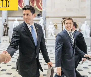  ?? ANDREW HARNIK / THE ASSOCIATED PRESS ?? House Speaker Paul Ryan greets guests as he walks to the House Chamber on Capitol Hill Thursday. The Republican health care bill passed a House vote Thursday in a victory for Ryan, after an early version was rejected six weeks ago.