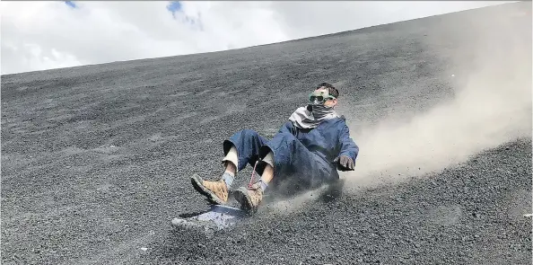  ?? PHOTOS: AVIVA GOLDFARB/THE WASHINGTON POST ?? If you’re in the mood for a little excitement, try sliding down the face of Nicaragua’s Cerro Negro volcano on a wooden sled.