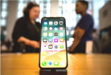  ?? — WP-Bloomberg photo ?? Apple said last Tuesday that the iPhone X drove it to record revenue for its second quarter.
