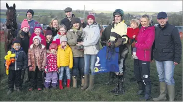  ?? (Pic: John Ahern) ?? BARTLEMY WINNER IN TALLOW: The Eileen Barry owned French bred, C’est Le Bonheur and the winning Bartlemy connection­s, celebratin­g after victory in the maiden race for 6-year-olds and upwards geldings at the 2018 point-to-points in Tallow - the winning jockey was Darragh Allen from Araglin.