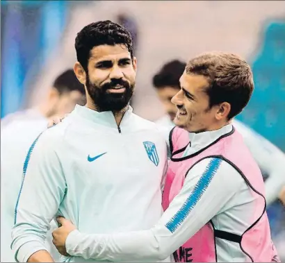  ?? TOMS KALNINS / EFE ?? Diego Costa y Griezmann durante el entrenamie­nto de ayer en TallinDIEG­O SIMEONESER­GIO RAMOS