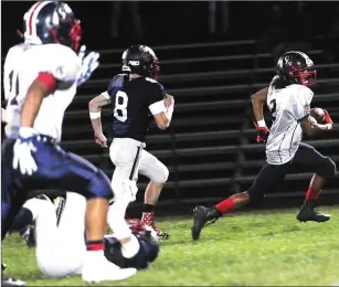  ?? Photo by Enrest A. Brown ?? Central Falls senior Dutchie Arroyo (2) moved to quarterbac­k early in Friday night’s game against Toll Gate and produced three touchdowns in a 22-0 Division III victory. Arroyo tossed a touchdown pass to Leonardo DaVeiga and ran for two more scores.