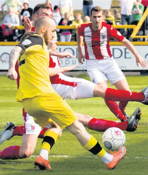  ?? Adam Dawson in action for Southport against Brackley Simon Marshall ??