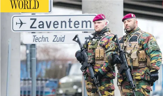  ?? PHOTOS: GEERT VANDEN WIJNGAERT / THE ASSOCIATED PRESS ?? Soldiers patrol at Zaventem Airport in Brussels. The Paris and Brussels attacks, carefully co-ordinated, make us realize that there’s no end in sight, writes Robert Fulford.