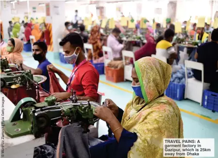  ??  ?? TRAVEL PAINS: A garment factory in Gazipur, which is 25km away from Dhaka