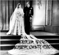  ??  ?? TOP: Then Princess Elizabeth with the Duke of Edinburgh after their wedding. ABOVE: Elizabeth escorted down the aisle by her father, King George VI (Jared Harris) in The Crown.