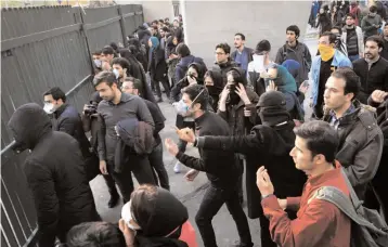  ?? — AFP ?? Iranian students protest at the University of Tehran during a demonstrat­ion driven by anger over economic problems in Tehran.