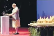  ?? PTI PHOTO ?? Prime Minister Narendra Modi addresses the Indian diaspora at Dubai Opera, where he launched a project to construct the first Hindu temple in Abu Dhabi on Saturday.
