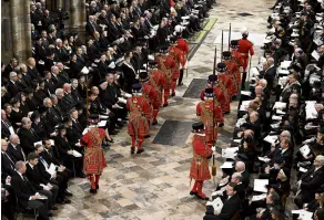  ?? PHOTO: GETTY IMAGES ?? The Yeoman of the Guard arrive in Westminste­r Abbey.