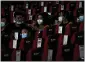  ?? ANDY WONG — THE ASSOCIATED PRESS ?? People wearing face masks to help curb the spread of the coronaviru­s chat each other as the watch a film at Poly Cinema in Beijing on Thursday.