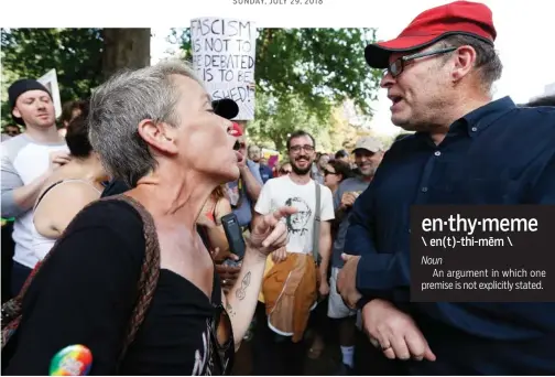  ?? MICHAEL DWYER/THE ASSOCIATED PRESS ?? SUNDAY, JULY 29, 2018 Protesters with opposing views face off at a “Free Speech” rally organized by conservati­ve activists last year in Boston.