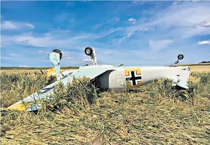  ??  ?? Barry Conway’s replica Focke-wulf flipped over when he landed in a field after mistaking tractor tracks for an airstrip
