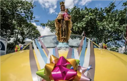  ?? FOTO SANTIAGO MESA ?? La tradición de encomendar­se a la Virgen del Carmen inició en un viaje de Israel a España y, luego, después de expandirse en el país ibérico, llegó a Colombia.