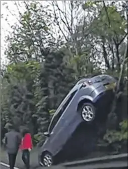  ??  ?? A car rolled down Detling Hill and became lodged in a tree