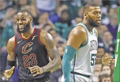  ?? AP ?? LeBron James has a smile on his face again during Cleveland’s beatdown of Eastern Conference rival Celtics Sunday afternoon, as the newest additions to roster make fast impact and make Cavs look like the contenders they were supposed to be.