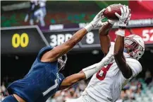  ?? Brook Mitchell / Getty Images ?? Stanford free safety Justin Reid, right, makes the grab instead of Rice’s Justin Bickham last season. Reid is now a Texan, too.
