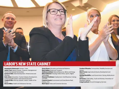  ??  ?? VICTORY LAP: Coralee O’Rourke and fellow MPs give Premier Annastacia Palaszczuk a standing ovation at yesterday’s caucus meeting.