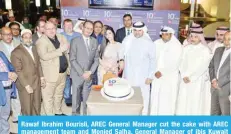  ??  ?? Rawaf Ibrahim Bourisli, AREC General Manager cut the cake with AREC management team and Monjed Salha, General Manager of ibis Kuwait Salmiya.