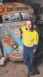  ?? Picture: ZAK SIMMONDS ?? SMOOTH RIDES: Paul Oakley with his 1959 Ford Skyliner, left, and the 1948 REO he is restoring.