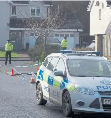  ??  ?? Police sealed off Honeywell Court in Stepps after a shooting last night. Picture: Mark Gibson