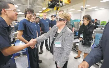  ??  ?? Apprentice­s at B. Braun Medical Inc. meet state Labor &amp; Industry Deputy Secretary Eileen Cipriani in 2017. In addition to its apprentice­ship training program, B. Braun offers a tour and mock interviews to Catasauqua Area students, helping the district train youths to be ready for a career.