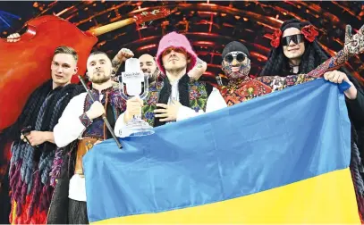  ?? Picture: AFP ?? JUBILATION. Members of the band Kalush Orchestra with the winner’s trophy and Ukraine’s flags after winning the Eurovision Song contest on Saturday at the Pala Alpitour venue in Turin, Italy.