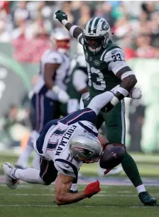  ?? NANCy lANE / HERAlD STAFF FIlE ?? NICE KNOWING YOU: Jets safety Jamal Adams delivers a hit on Julian Edelman to force an incompleti­on during a 2018 contest..