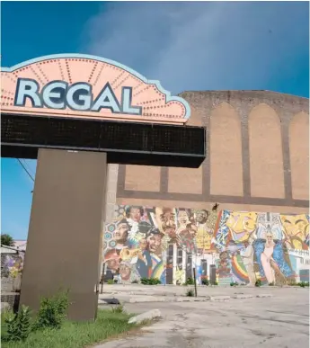  ?? MAX HERMAN/FOR THE SUN-TIMES ?? A mural decorates the outside of the Avalon Regal Theater in South Shore. The current owner of the shuttered theater is trying to raise money to reopen.