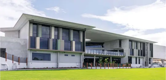  ??  ?? ABOVE A.B Paterson College, a private school based on the Gold Coast in Queensland, recently engaged Burling Brown Architects to design a modern three-storey learning centre filled with natural light, featuring new technology and energy efficient glazing. Photograph­y by A.B Paterson College. PREVIOUS Assa Abloy’s SL500 Sliding Door. Photograph­y courtesy of Assa Abloy Entrance Systems.