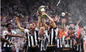  ?? Photograph: Justin Setterfiel­d/Getty Images ?? Grimsby celebrate at the London Stadium after their third straight extra-time victory secured promotion.