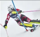  ?? FABRICE COFFRINI/AFP/GETTY IMAGES ?? Marie-Michele Gagnon skis to a sixth-place finish in St. Moritz, Switzerlan­d, on Friday.