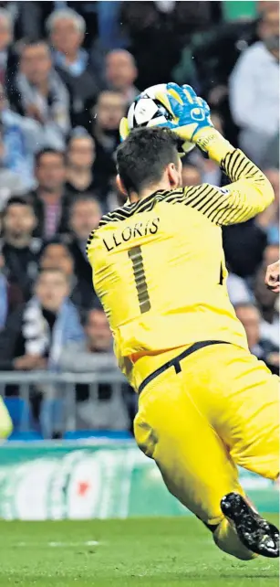  ??  ?? Holding firm: Hugo Lloris denies Cristiano Ronaldo during an inspired performanc­e