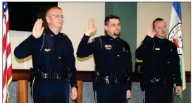  ??  ?? Doug Walker / RN-T
Three Rome Police officers received promotions Monday. Danny Story (from left) was promoted to Lieutenant, and Brandon Pledger and Ryan Hutchins were each promoted to Sergeant.